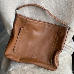 Coach Brown Sling with secret stash pockets
